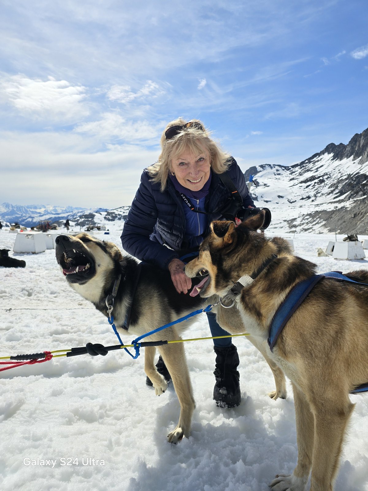Travellers with huskies in Skagway, Alaska